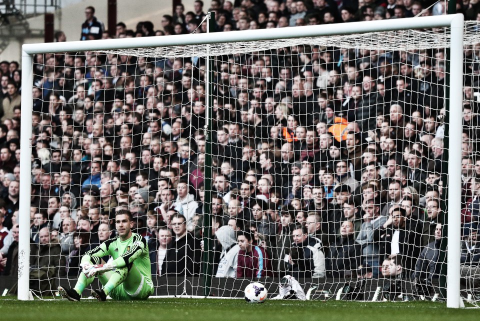  West Ham keeper Adrian could only watch in horror as the ball looped over him