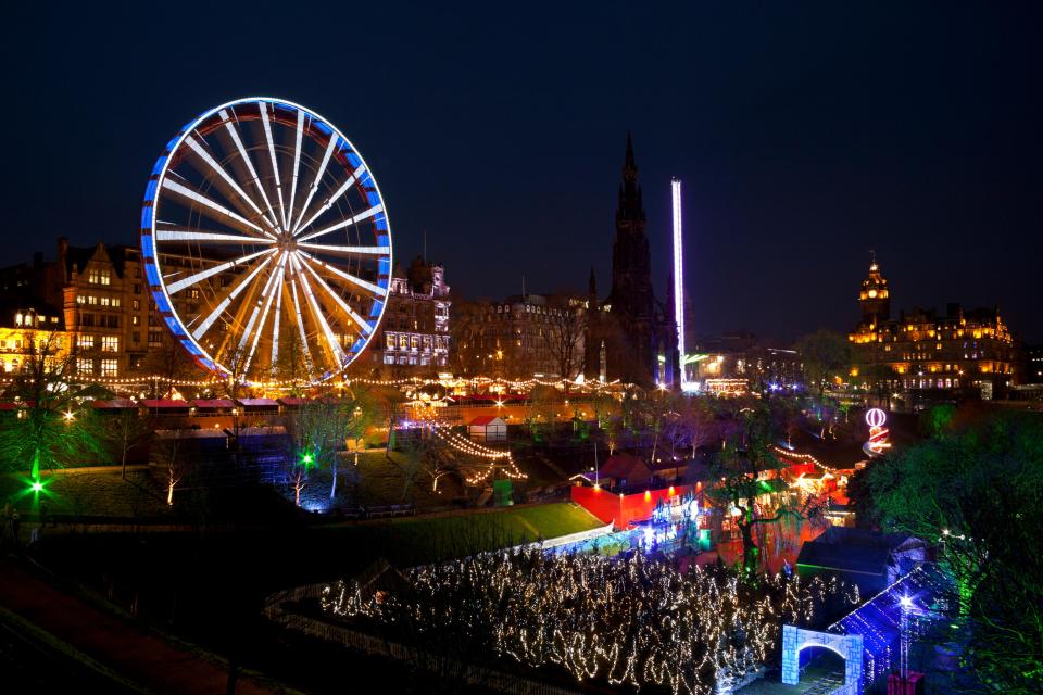 Edinburgh, Scotland, UK. 21st November, 2014. Edinburgh's festive and Christmas celebrations started sluggishly with the opening of the European market stalls and other attractions delayed beyond the expected 5pm opening time, there is a Big Wheel in