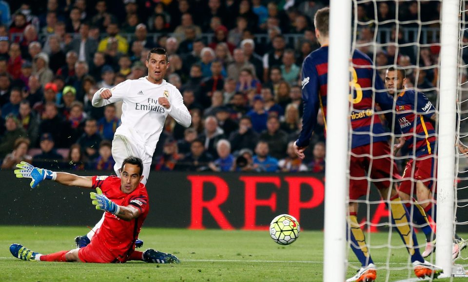  Cristiano Ronaldo fires past ex-Barca keeper Claudio Bravo, now at Man City in the El Clasico last April