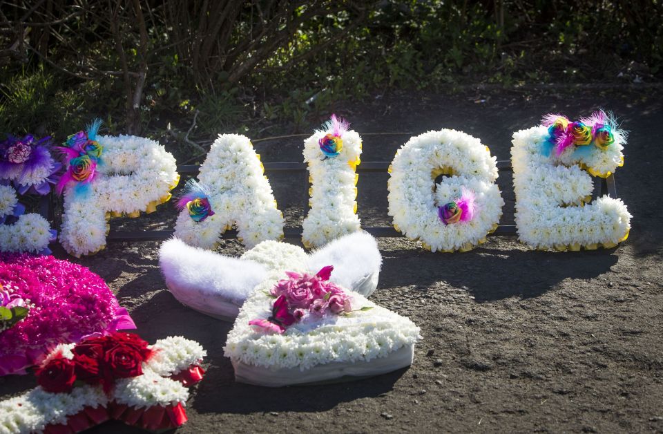  Floral tributes outside St Margaret's Church in Clydebank following Paige's funeral