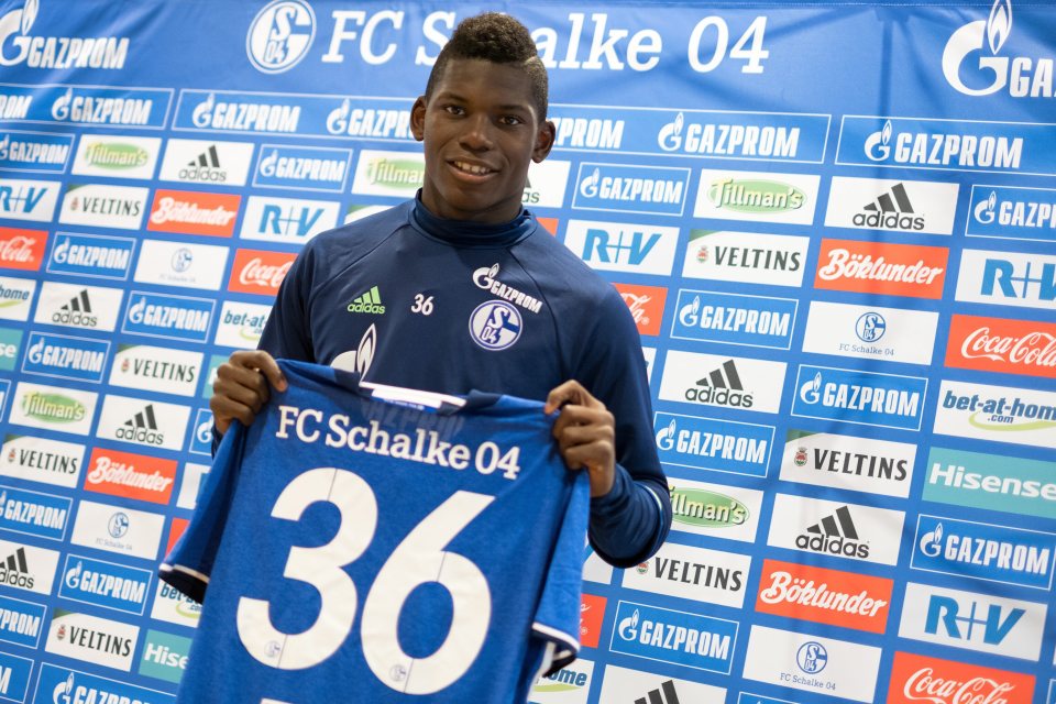  Breel Embolo poses with Schalke shirt after completing summer move from Basel