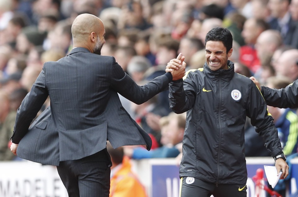  Pep Guardiola with his assistant, Mikel Arteta