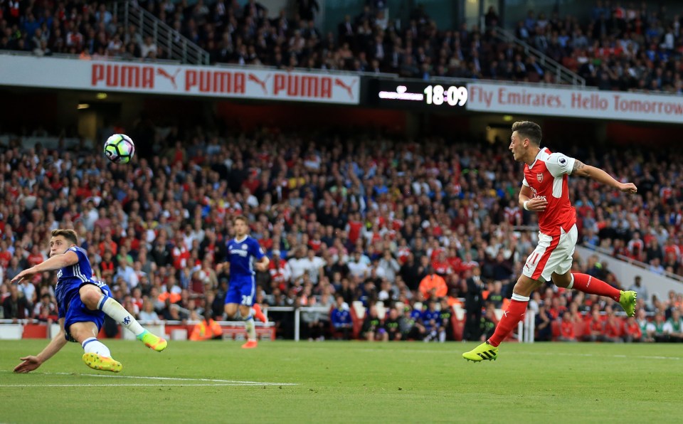  Mesut Ozil scores Arsenal's 3rd goal in a 3-0 win over Chelsea