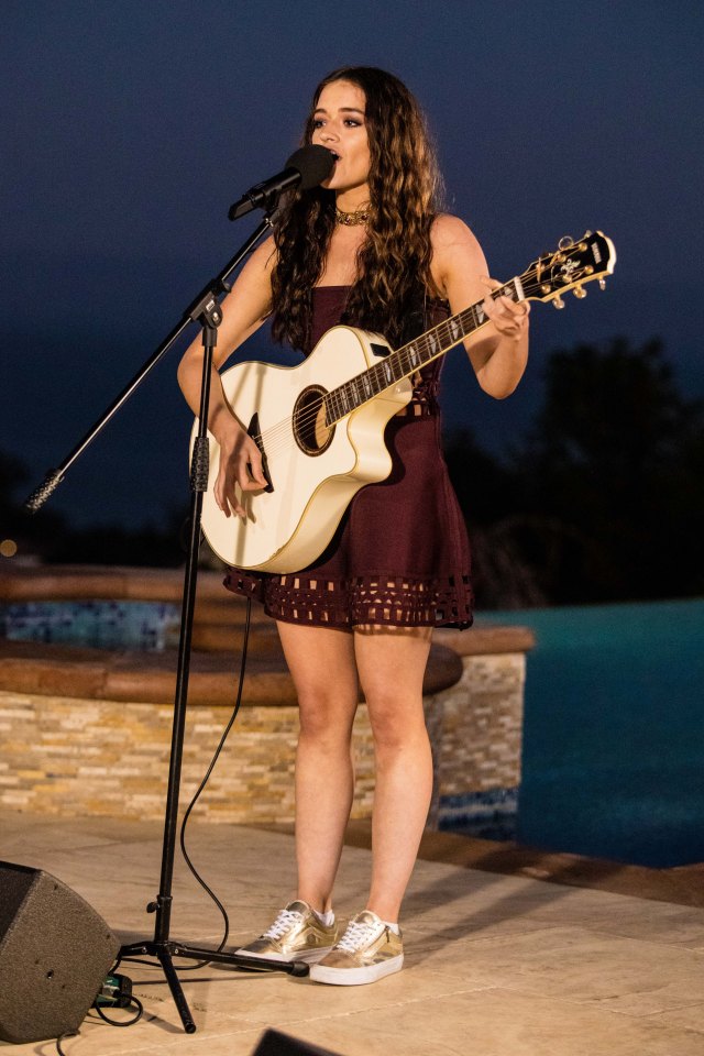  She had to learn the new song on her guitar