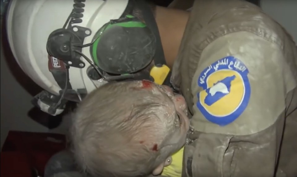 Rescue volunteer bursts into tears after rescuing a baby girl caught in Assad bombings