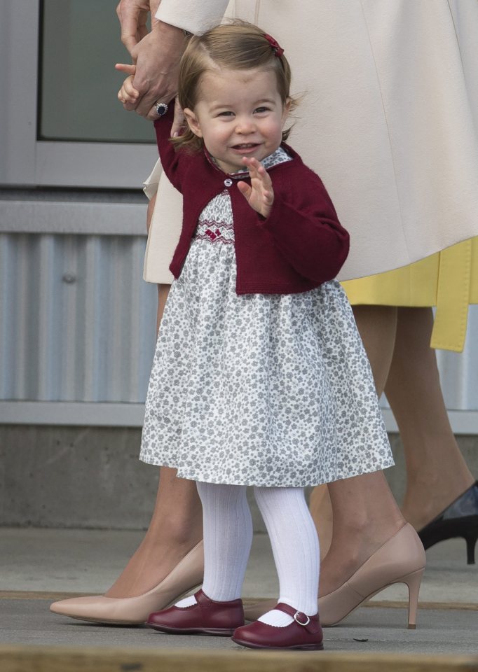 Even Charlotte managed a wave as she prepared to leave Canada