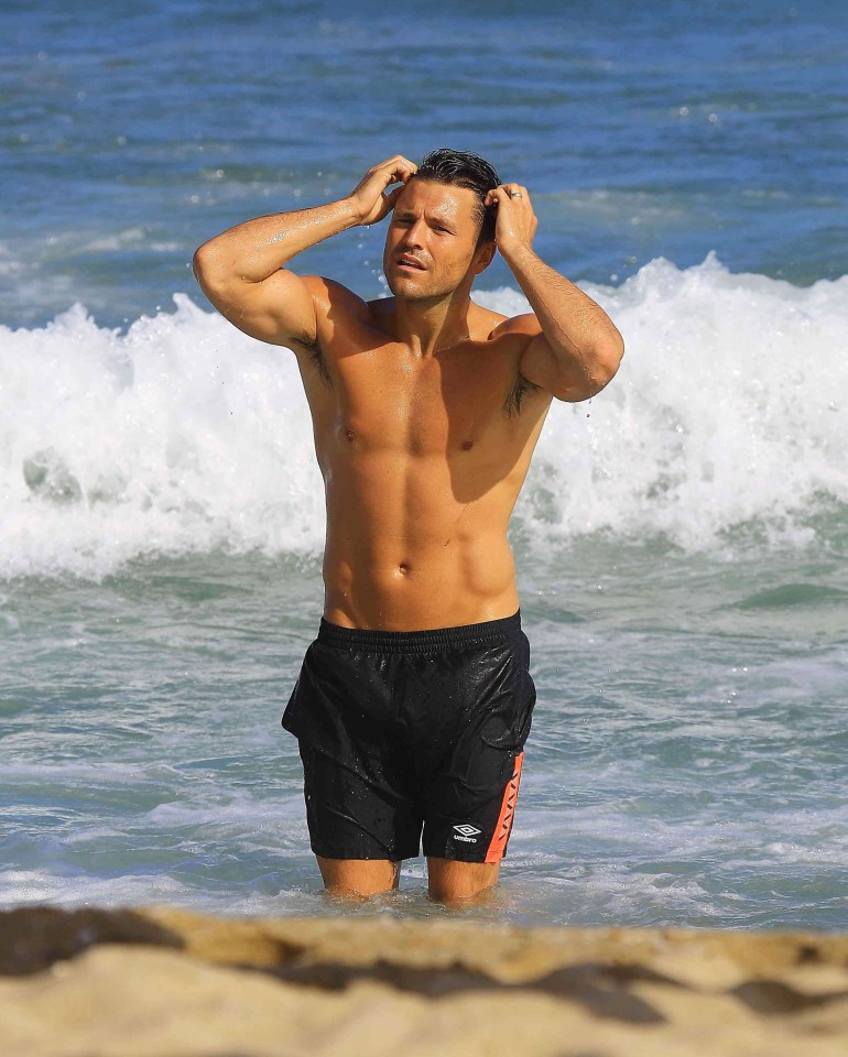  Former Towie star Mark Wright showcased his rock hard abs as he took part in a photoshoot in Barcelona