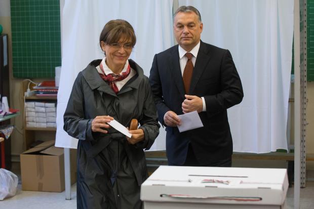 Orban and his wife prepare to cast their votes in Budapest