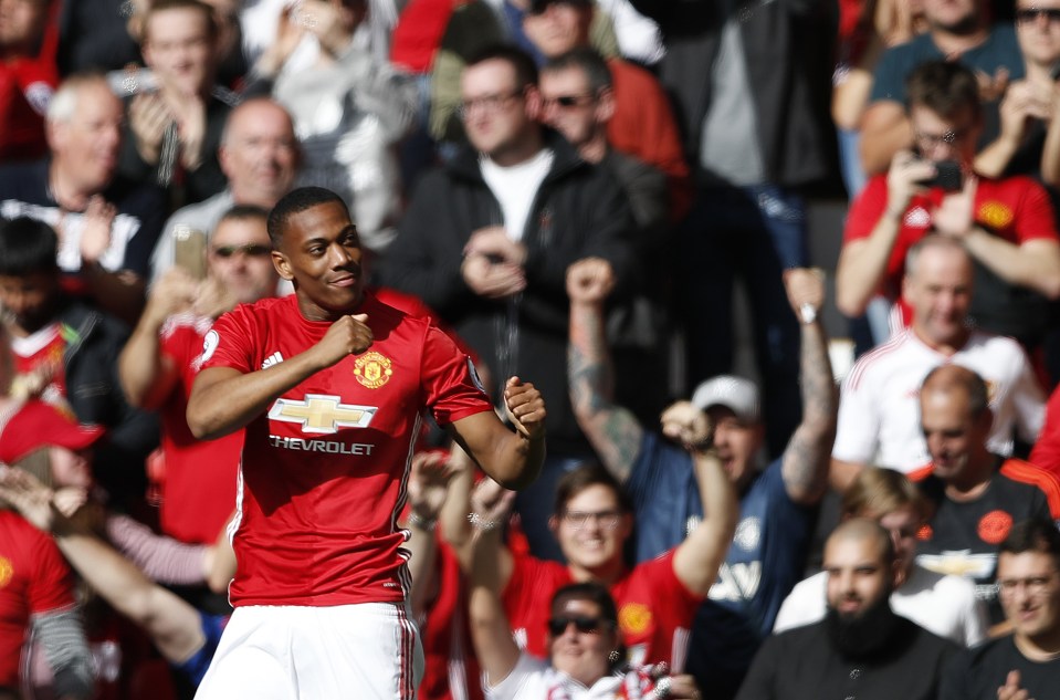  Anthony Martial celebrates scoring the first goal of the game