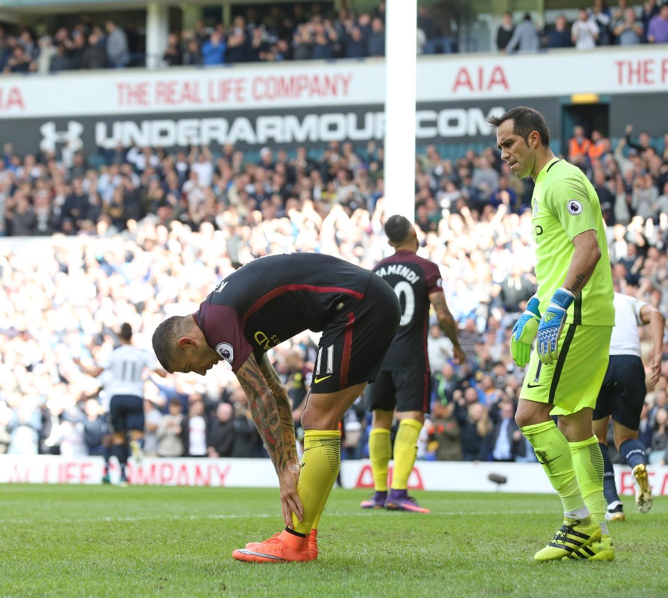  Dejected Aleksandar Kolarov after his own goal set Spurs on their way