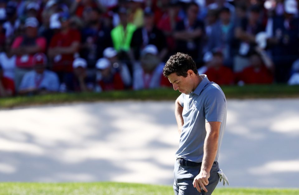  A dejected Rory McIlroy was beaten by Patrick Reed in the singles