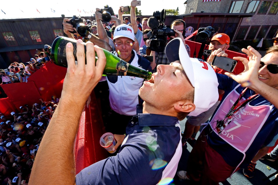  Jordan Spieth knocks back the booze after America winning the Ryder Cup