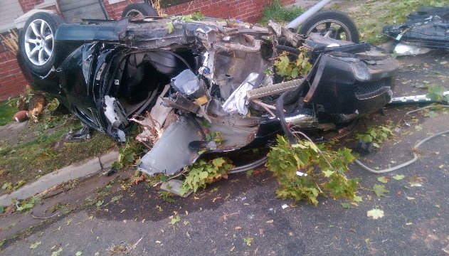  A picture of car wreckage , believed to be the gamer's, was posted by Aurora Police