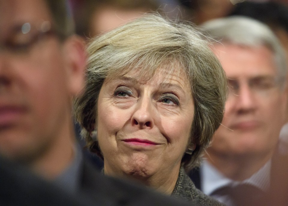  Theresa May looked deep in thought while Philip Hammond was on the stage telling people the Conservative Party had received the message from the British people 'loud and clear'