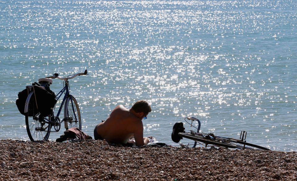  But that didn't stop some enjoying the last of the summer sun on Brighton beach in East Sussex