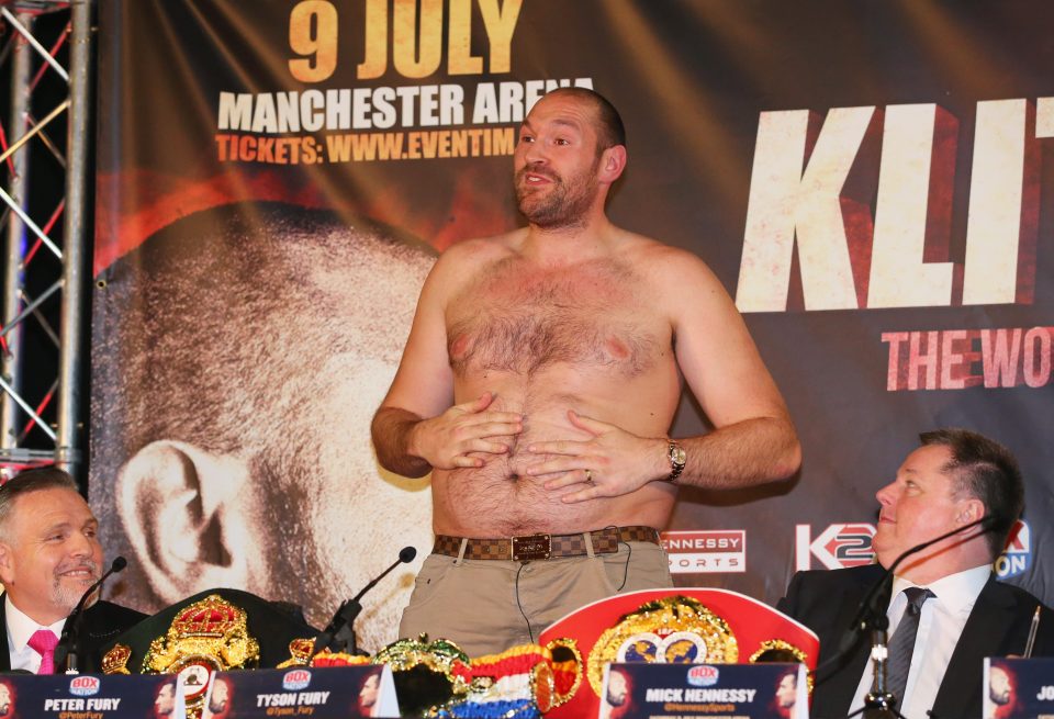  Fury shows off his belly in build up to postponed rematch with Klitschko