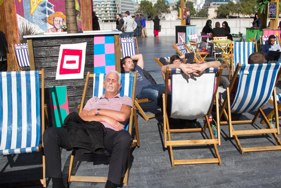  Some took advantage of the autumn sunshine and glorious weather on London's riverside