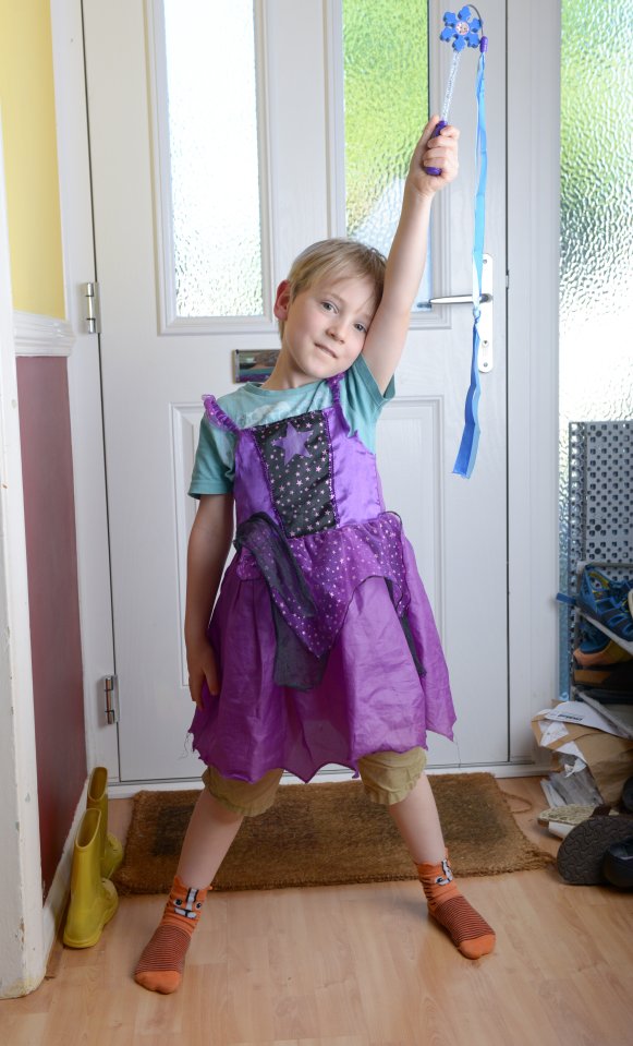  Isaac is just four but loves dressing up in costumes, including his purple fairy outfit