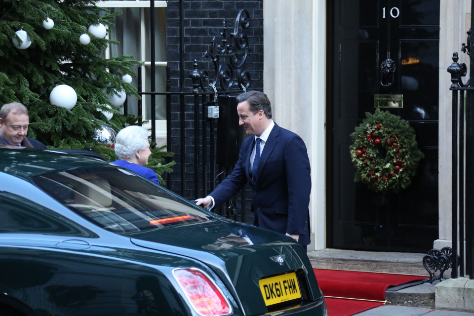  The Queen is greeted by PM David Cameron as she steps out of her unique Bentley