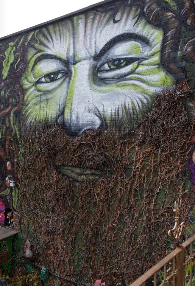  The quirky beer garden also features a giant ivy-bearded druid mural