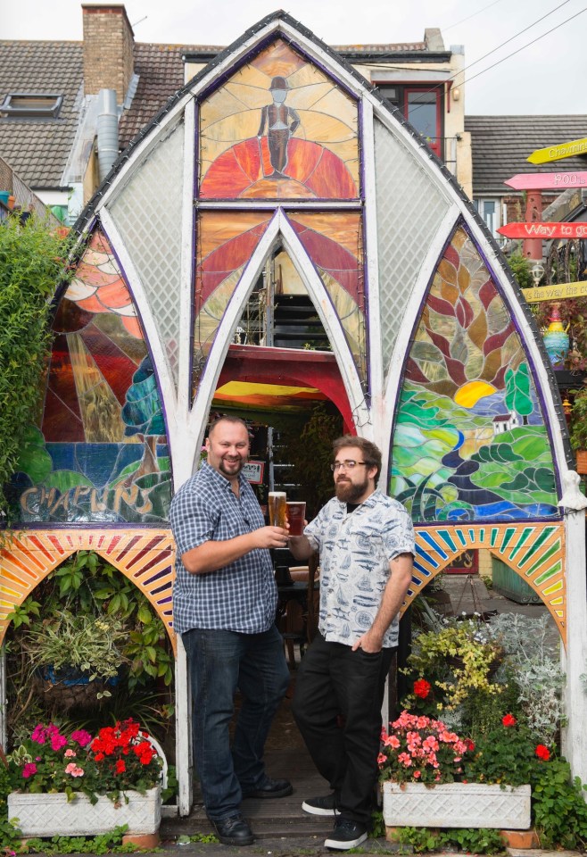  Geoff Popple, right, and Carl Filer in front of the 15-ft stained glass 'mystical arch'