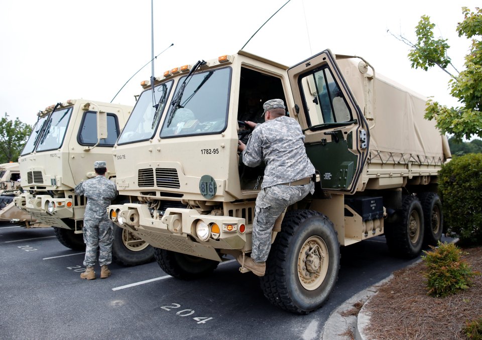 Members of the National Guard ready themselves for "catastrophic" Hurricane Matthew