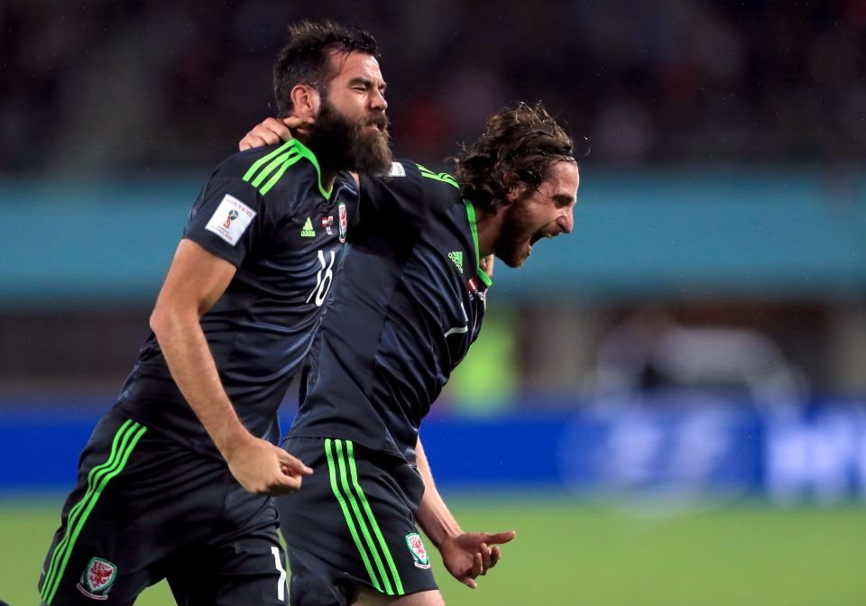  Joe Allen celebrates scoring a screamer for Wales