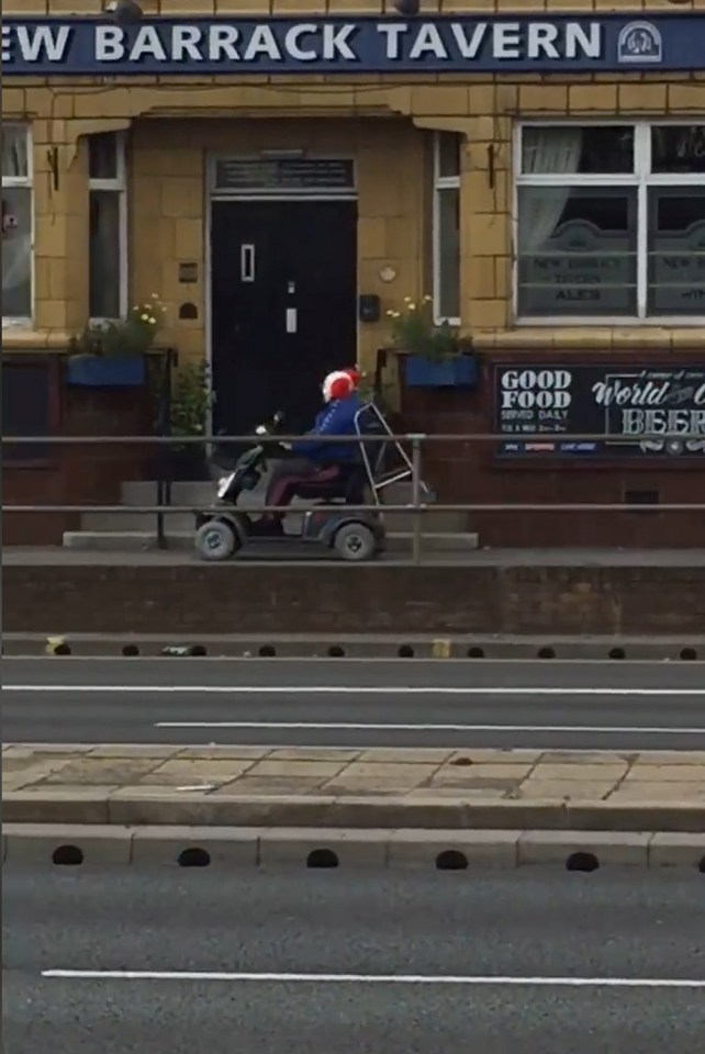  This clown was seen going along on a mobility scooter outside a pub in the Hillsborough area of Sheffield