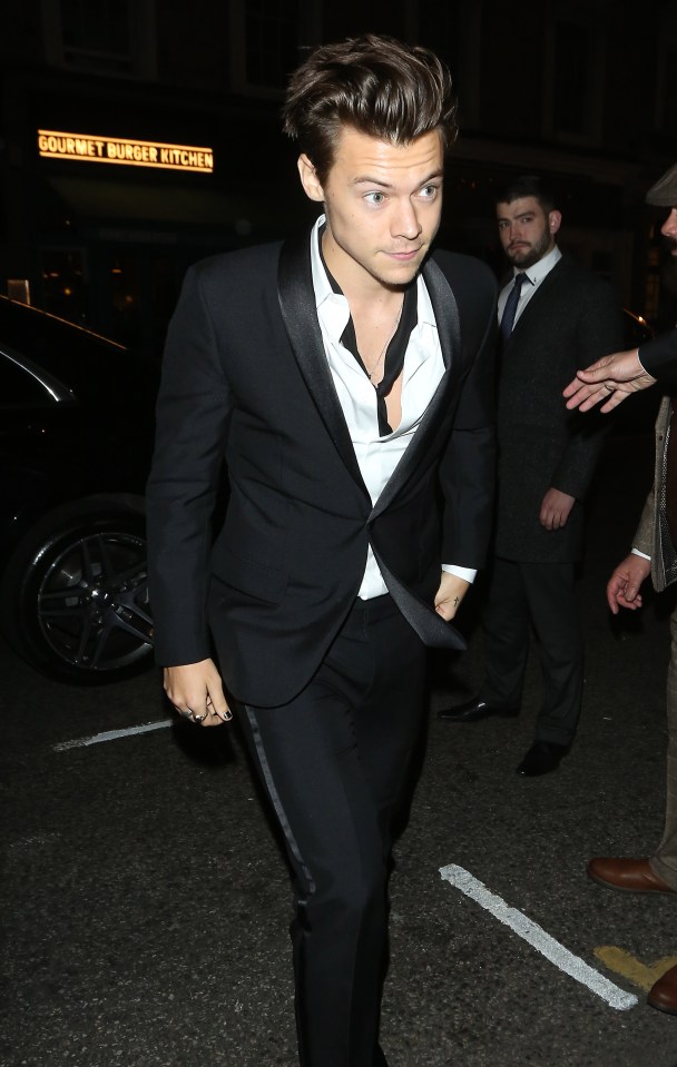  Harry went for the rock star tux look with an open collar