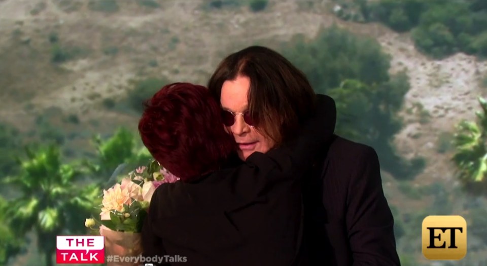  Thank you ... Sharon gives husband Ozzy a hug after he surprised her on The Talk