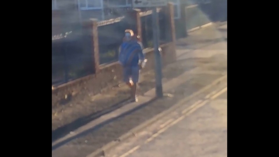  Scary clown gave resident of Manchester a shock when he filmed him walking along street in broad daylight