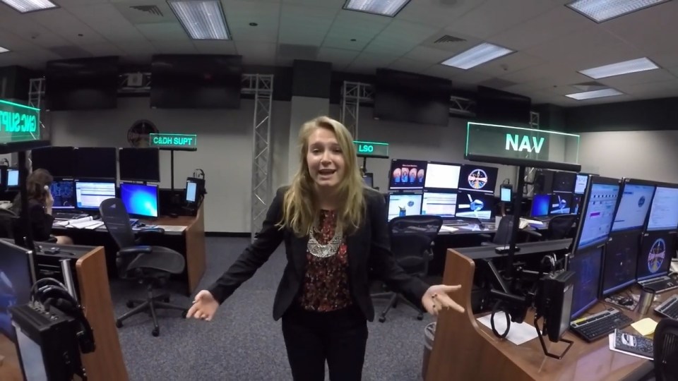  One of the interns raps in the Mission Control room at the Johnson Space Center in Houston