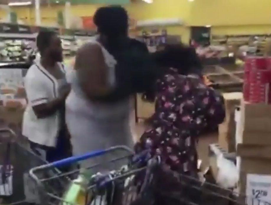 The two women were filmed taking part in a brutal fist fight inside the Walmart store