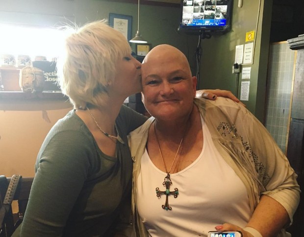 Paris Jackson has shared a heart-warming picture kissing her mother Debbie Rowe who is currently battling cancer