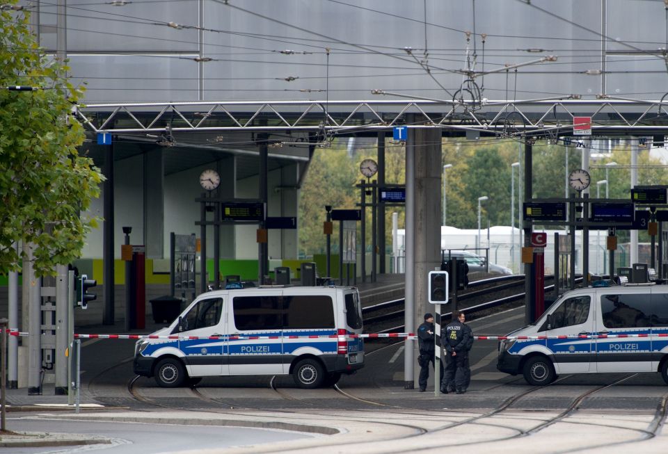  The city's train station was temporarily closed as police hunt for a suspect after foiling a bomb plot