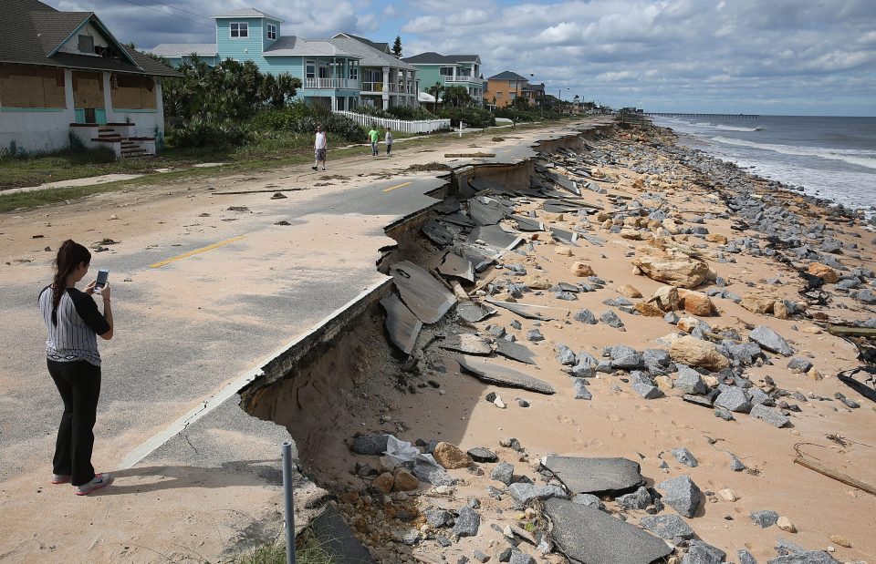  The A1A road is seen after ocean waters stirred up by Hurricane Matthew washed away part of the ocean front