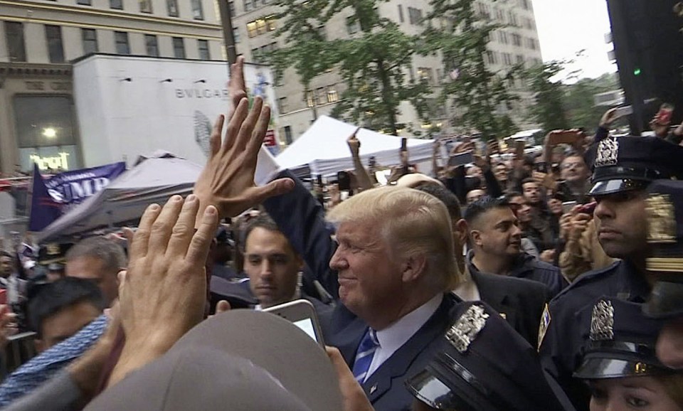  Donald Trump was greeted by supporters outside Trump Towers in New York on Saturday