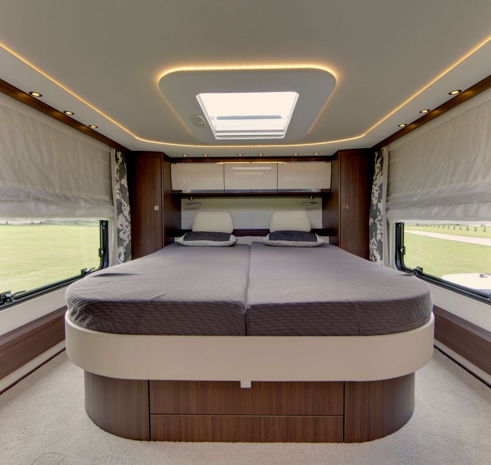  The luxury 'super-liner' motorhome features under-floor heating and a panoramic roof that be viewed from the double bed