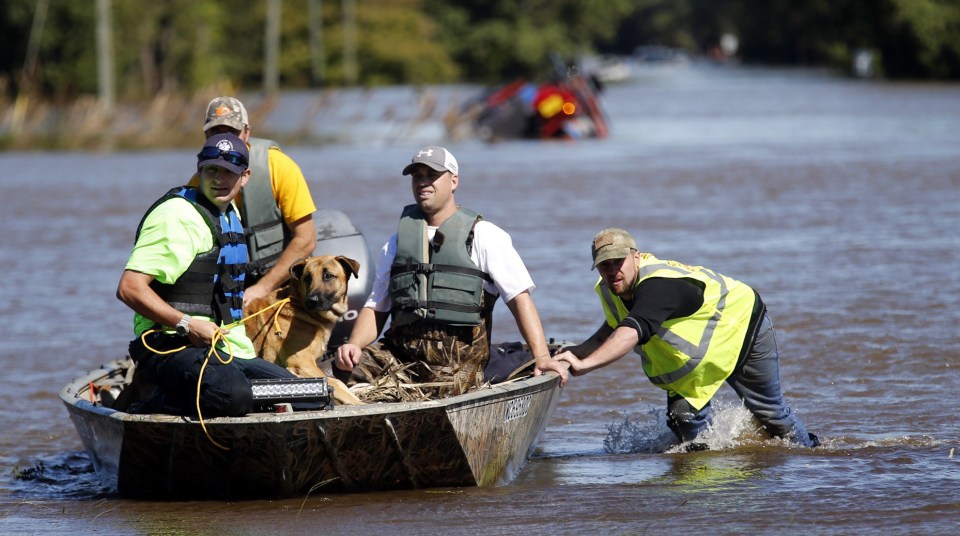  Thousands have needed to be rescued after becoming trapped in their homes and cars in the US