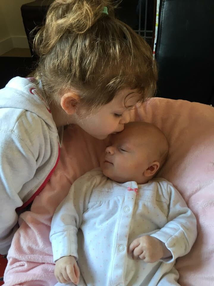 Mia recovering with big sister Bridget