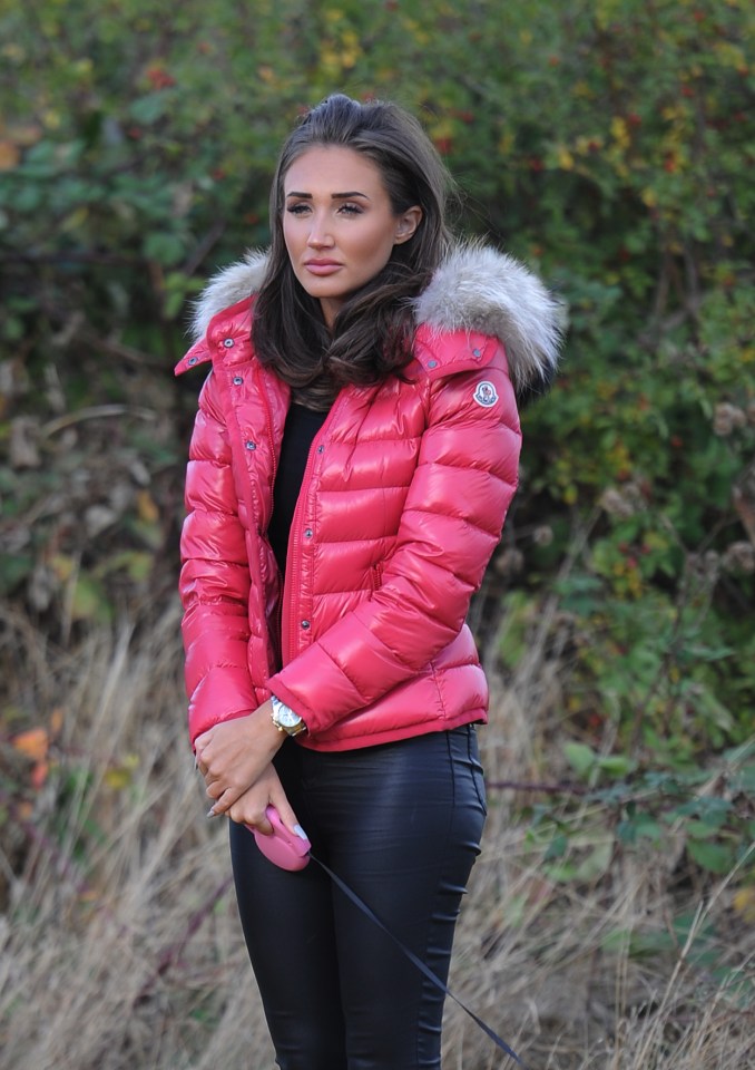  Megan wrapped up against the cold in a padded jacket