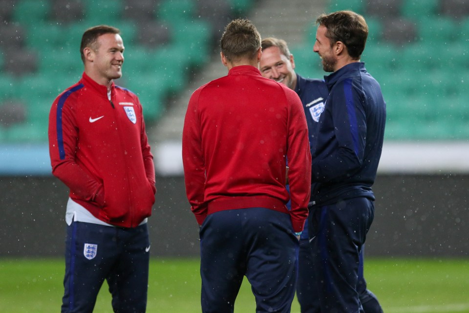 Gareth Southgate enjoys a laugh with Wayne Rooney and striker Jamie Vardy 