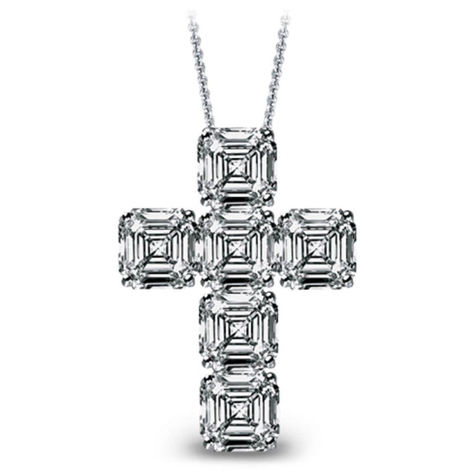  The platinum mounted diamond cross is believed to be similar to this one from Jacob and Co