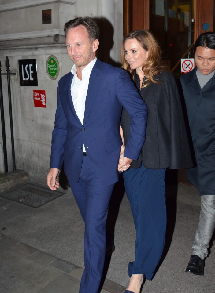  Geri Horner covered her baby bump with a chic black cape