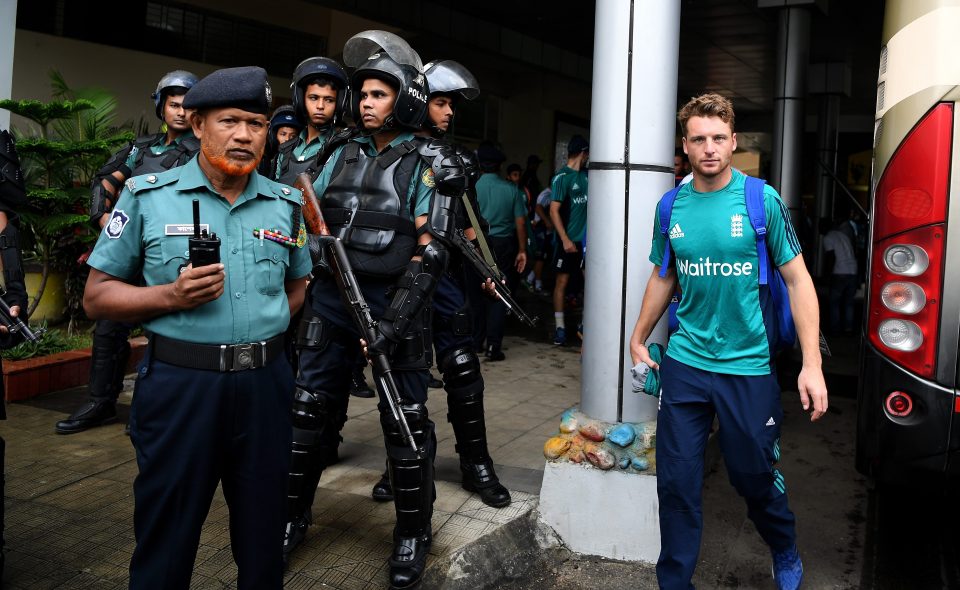  Jos Buttler heads towards the England team bus in Bangladesh