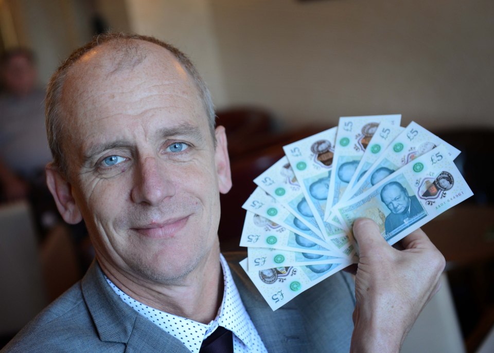  Hotel manager Tim Mitchell pictured with his valuable £5 notes with low serial numbers which he reckons are worth £1,000