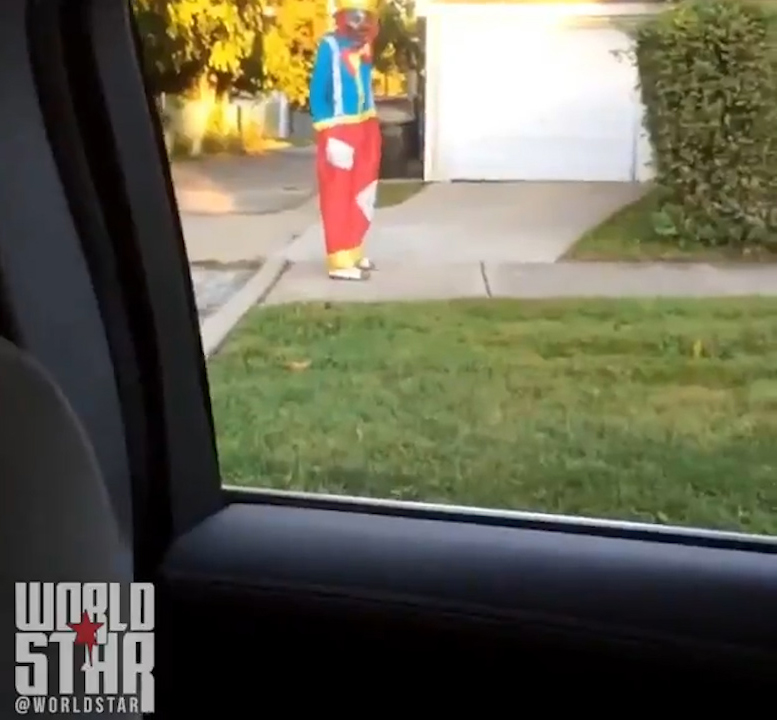  The fully-costumed clown is spotted walking down the street