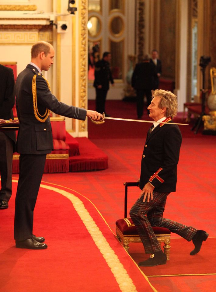  Rod Stewart is knighted by Prince William at Buckingham Palace