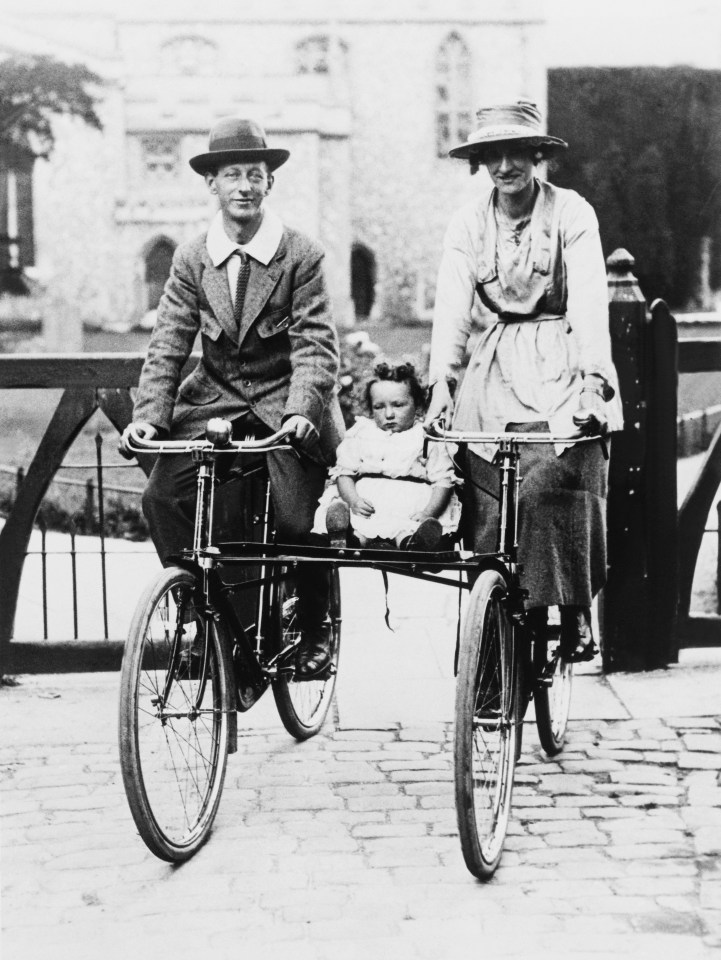 Baby Carried By Bicycle By Is Parents In England