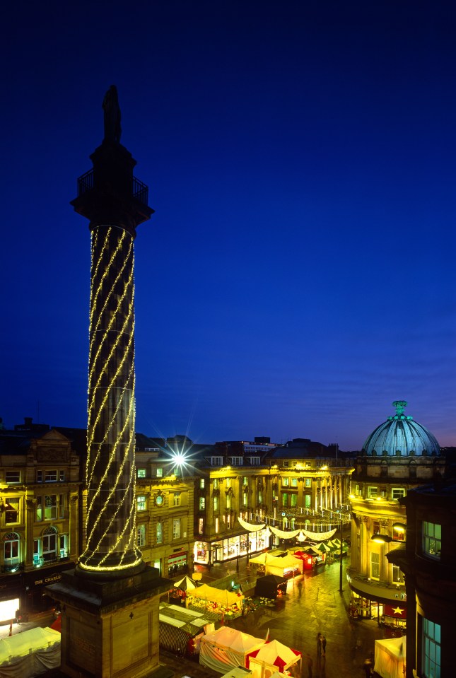  Grey's Monument is lit up for Newcastle's Christmas market